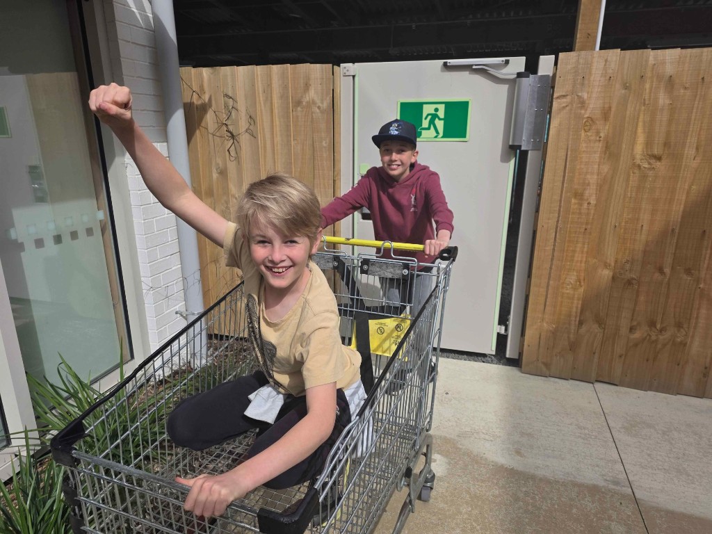 Creators having fun with a shopping cart between sessions.